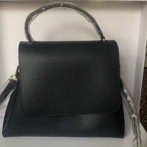 Navy Estée Lauder handbag